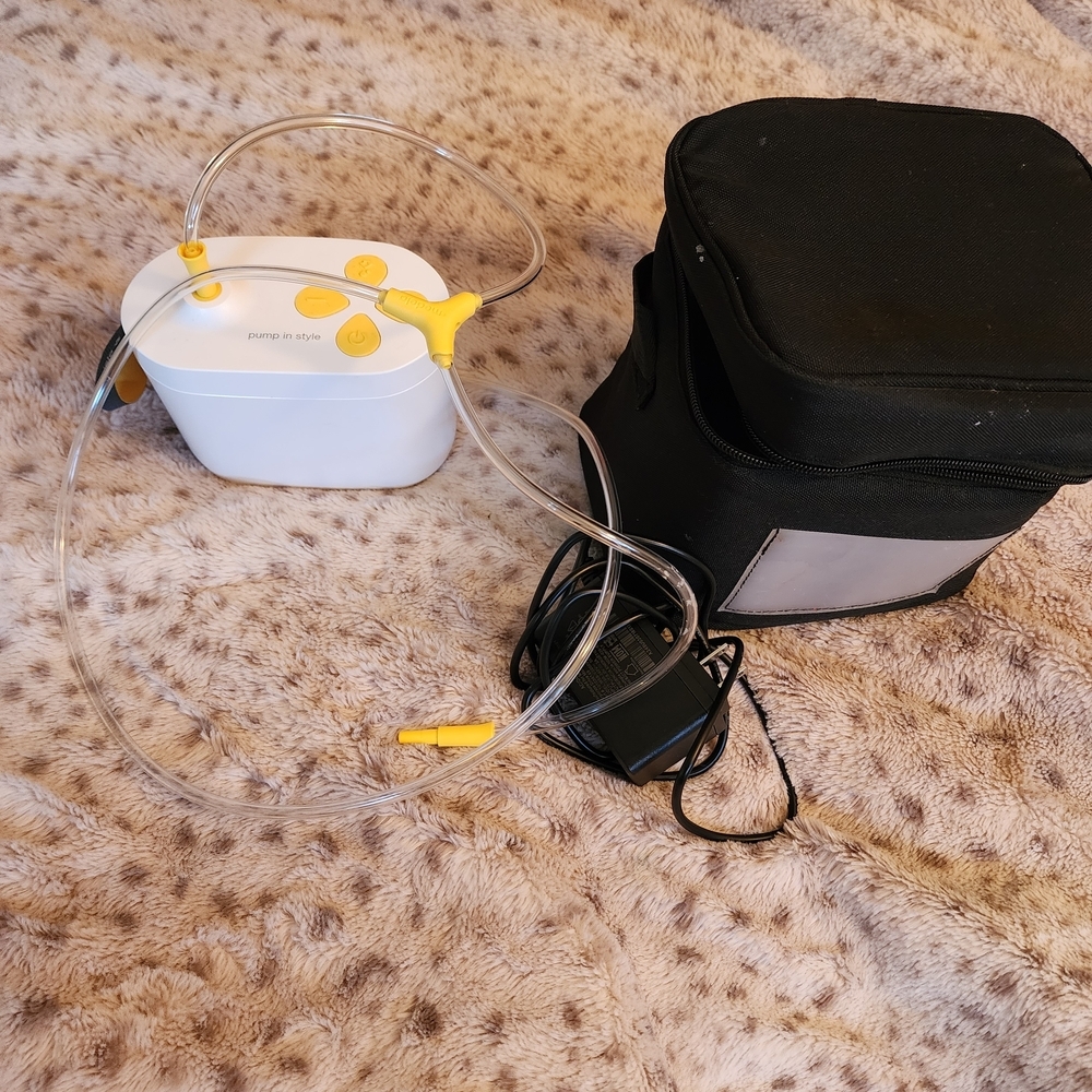 White and Yellow Breast Pump with Black Carrying Case